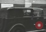 Standbild britischen Menschen tragen nach Blitz Angriff London England Vereinigtes Königreich, 1941, aus Sekunde 12 historischem Filmmaterial Videoclip 65675062256