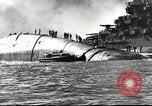 Image of Devastation from Japanese attack on Pearl Harbor Pearl Harbor Hawaii USA, 1941, second 44 stock footage video 65675062272
