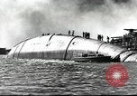 Image of Devastation from Japanese attack on Pearl Harbor Pearl Harbor Hawaii USA, 1941, second 46 stock footage video 65675062272