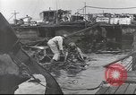Image of Devastation from Japanese attack on Pearl Harbor Pearl Harbor Hawaii USA, 1941, second 50 stock footage video 65675062272