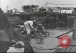 Image of Devastation from Japanese attack on Pearl Harbor Pearl Harbor Hawaii USA, 1941, second 51 stock footage video 65675062272