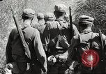Image of prisoners of war Philippines, 1945, second 40 stock footage video 65675062293