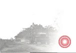 Image of Americans rescued from Japanese prison camp ride in trucks Guimba Nueva Ecija Philippines, 1945, second 1 stock footage video 65675062322