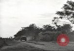 Image of Americans rescued from Japanese prison camp ride in trucks Guimba Nueva Ecija Philippines, 1945, second 7 stock footage video 65675062322