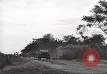 Image of Americans rescued from Japanese prison camp ride in trucks Guimba Nueva Ecija Philippines, 1945, second 10 stock footage video 65675062322