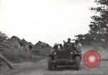 Image of Americans rescued from Japanese prison camp ride in trucks Guimba Nueva Ecija Philippines, 1945, second 14 stock footage video 65675062322