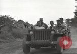 Image of Americans rescued from Japanese prison camp ride in trucks Guimba Nueva Ecija Philippines, 1945, second 22 stock footage video 65675062322