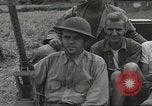 Image of Americans rescued from Japanese prison camp ride in trucks Guimba Nueva Ecija Philippines, 1945, second 26 stock footage video 65675062322