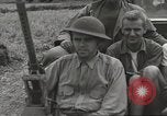 Image of Americans rescued from Japanese prison camp ride in trucks Guimba Nueva Ecija Philippines, 1945, second 30 stock footage video 65675062322