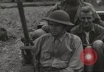 Image of Americans rescued from Japanese prison camp ride in trucks Guimba Nueva Ecija Philippines, 1945, second 31 stock footage video 65675062322