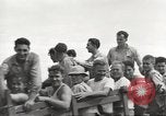 Image of Americans rescued from Japanese prison camp ride in trucks Guimba Nueva Ecija Philippines, 1945, second 48 stock footage video 65675062322
