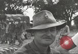 Image of Americans rescued from Japanese prison camp ride in trucks Guimba Nueva Ecija Philippines, 1945, second 52 stock footage video 65675062322