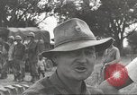 Image of Americans rescued from Japanese prison camp ride in trucks Guimba Nueva Ecija Philippines, 1945, second 54 stock footage video 65675062322