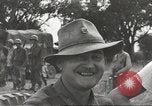 Image of Americans rescued from Japanese prison camp ride in trucks Guimba Nueva Ecija Philippines, 1945, second 55 stock footage video 65675062322