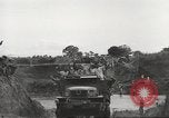Image of Americans rescued from Japanese prison camp ride in trucks Guimba Nueva Ecija Philippines, 1945, second 59 stock footage video 65675062322