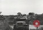 Image of Americans rescued from Japanese prison camp ride in trucks Guimba Nueva Ecija Philippines, 1945, second 60 stock footage video 65675062322