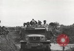 Image of Americans rescued from Japanese prison camp ride in trucks Guimba Nueva Ecija Philippines, 1945, second 61 stock footage video 65675062322