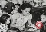 Immagine di Civili e studenti filippini Filippine, 1940, secondo 62 filmato di repertorio 65675062334