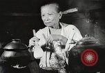 Image of Filipino foods and markets Philippines, 1940, second 23 stock footage video 65675062338
