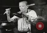 Image of Filipino foods and markets Philippines, 1940, second 24 stock footage video 65675062338