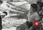 Image of Japanese troops during occupation Philippines, 1942, second 27 stock footage video 65675062358