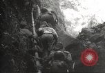 Image of Japanese soldiers in combat Philippines, 1942, second 31 stock footage video 65675062362