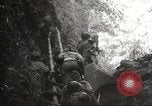 Image of Japanese soldiers in combat Philippines, 1942, second 32 stock footage video 65675062362