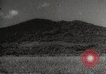 Image of Japanese soldiers in combat Philippines, 1942, second 35 stock footage video 65675062362