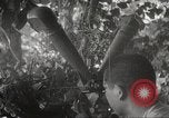 Image of Japanese soldiers in combat Philippines, 1942, second 46 stock footage video 65675062362