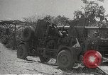 Standbild Amerikanische Rüstungsgüter die durch japanische in Philippinen Philippinen, 1942, aus Sekunde 13 historischem Filmmaterial Videoclip 65675062378