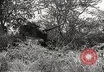Standbild Amerikanische Rüstungsgüter die durch japanische in Philippinen Philippinen, 1942, aus Sekunde 18 historischem Filmmaterial Videoclip 65675062378