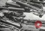 Standbild Amerikanische Rüstungsgüter die durch japanische in Philippinen Philippinen, 1942, aus Sekunde 44 historischem Filmmaterial Videoclip 65675062378