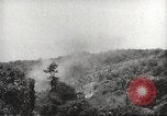 Image of Japanese officials review map Philippines, 1942, second 14 stock footage video 65675062386