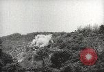 Image of Japanese officials review map Philippines, 1942, second 18 stock footage video 65675062386