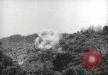 Image of Japanese officials review map Philippines, 1942, second 21 stock footage video 65675062386