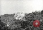 Image of Japanese officials review map Philippines, 1942, second 22 stock footage video 65675062386