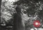 Image of Japanese officials review map Philippines, 1942, second 33 stock footage video 65675062386