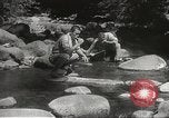 Image of Japanese officials review map Philippines, 1942, second 46 stock footage video 65675062386