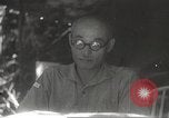 Image of Japanese officials review map Philippines, 1942, second 47 stock footage video 65675062386