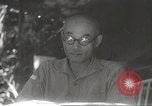 Image of Japanese officials review map Philippines, 1942, second 48 stock footage video 65675062386