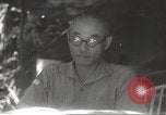 Image of Japanese officials review map Philippines, 1942, second 50 stock footage video 65675062386