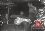 Image of Japanese officials review map Philippines, 1942, second 51 stock footage video 65675062386