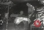 Image of Japanese officials review map Philippines, 1942, second 52 stock footage video 65675062386