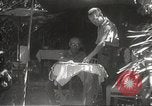 Image of Japanese officials review map Philippines, 1942, second 53 stock footage video 65675062386