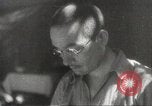 Image of Japanese officials review map Philippines, 1942, second 56 stock footage video 65675062386