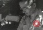 Image of Japanese officials review map Philippines, 1942, second 59 stock footage video 65675062386