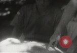 Image of Japanese officials review map Philippines, 1942, second 61 stock footage video 65675062386