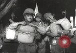 Image of Japanese infantry prepare for battle Bataan Luzon Philippines, 1942, second 45 stock footage video 65675062389