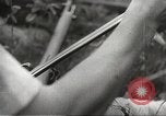 Image of Japanese infantry prepare for battle Bataan Luzon Philippines, 1942, second 49 stock footage video 65675062389