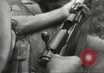 Image of Japanese infantry prepare for battle Bataan Luzon Philippines, 1942, second 51 stock footage video 65675062389